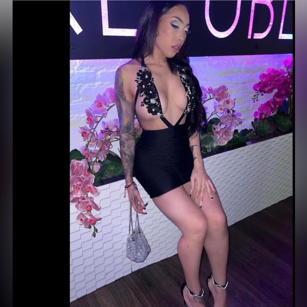 Black dress , cups are nudes with detailed silver crystal and white flowers
